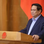 会議に出席したファン・ミン・チン首相