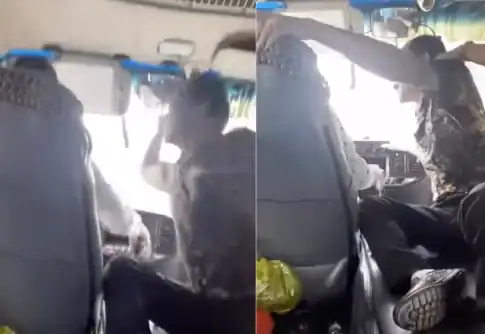走行中に暴行を受けるバスの運転手